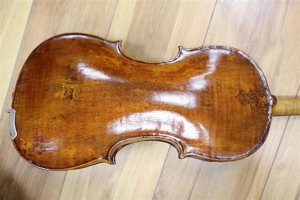 A 19th century Flemish? violin, length of back 35cm, cased with two bows